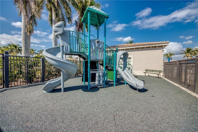 community jungle gym with fence
