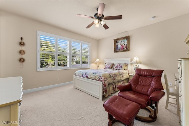 bedroom featuring carpet floors, ceiling fan, and baseboards