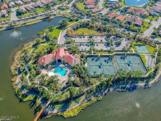 bird's eye view with a residential view and a water view