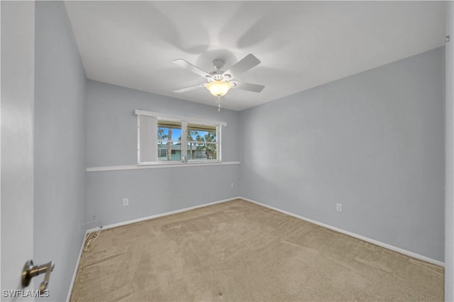 1015 Tropic Ter, North Fort Myers, FL 33903 - carpeted empty room with baseboards and ceiling fan