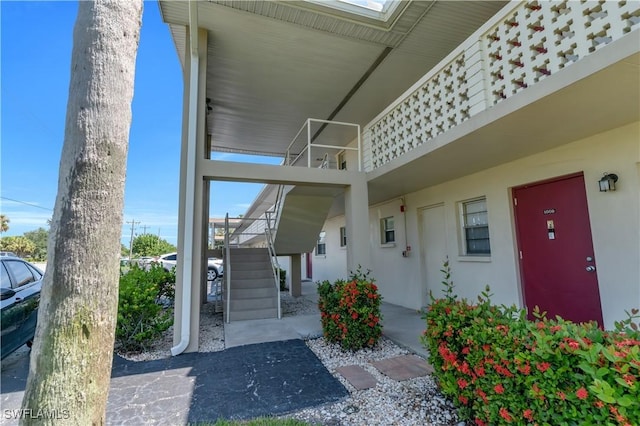1015 Tropic Ter, North Fort Myers, FL 33903 - view of exterior entry featuring stucco siding