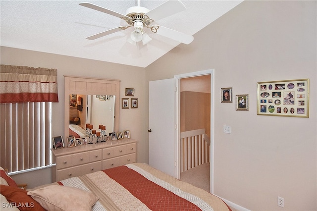 bedroom with ceiling fan and vaulted ceiling