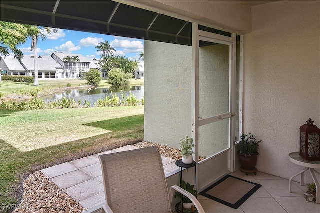 view of patio featuring a water view and a residential view