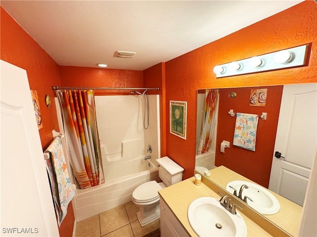 3007 NE 4th Ave, Cape Coral, FL 33909 - full bath with tile patterned floors, vanity, toilet, shower / tub combo with curtain, and a textured wall