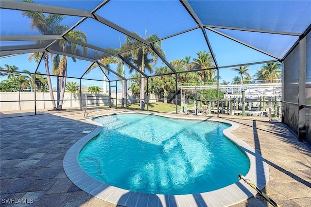 view of pool with a patio, fence, and a fenced in pool