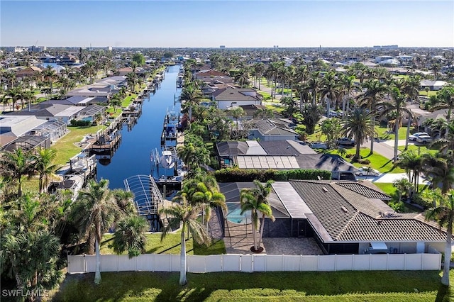 aerial view featuring a residential view and a water view