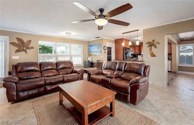 living room with light tile patterned floors, a healthy amount of sunlight, a ceiling fan, and crown molding