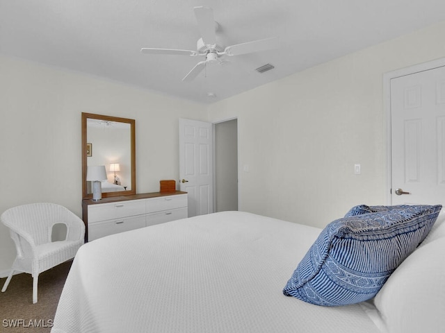 7539 Berkshire Pines Dr, Naples, FL 34104 - bedroom with carpet and a ceiling fan
