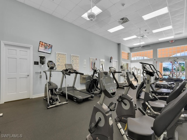 7539 Berkshire Pines Dr, Naples, FL 34104 - exercise room with a drop ceiling