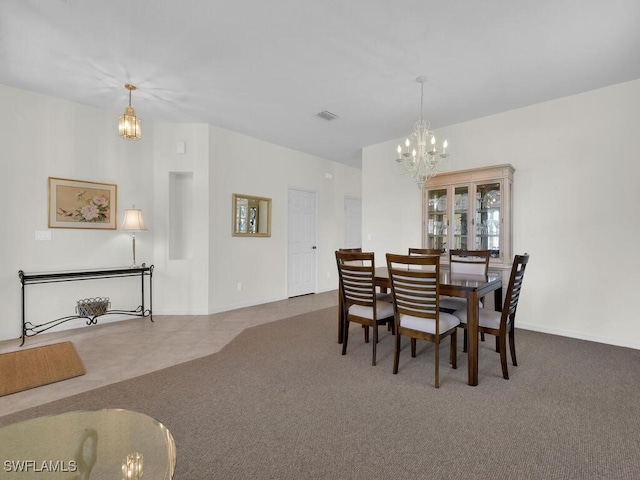 7539 Berkshire Pines Dr, Naples, FL 34104 - dining space featuring a chandelier, carpet flooring, and baseboards