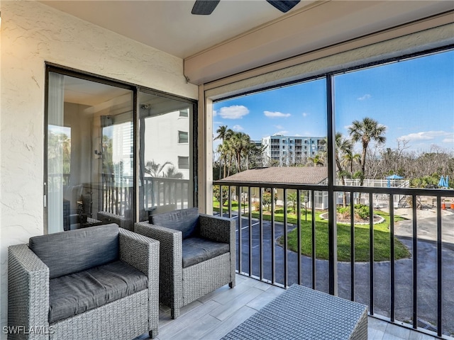 6893 Estero Blvd Unit 416, Fort Myers Beach, FL 33931 - sunroom / solarium featuring a ceiling fan