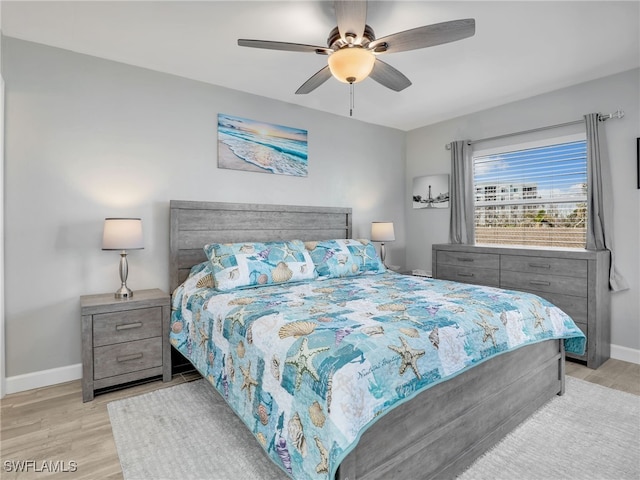 6893 Estero Blvd Unit 416, Fort Myers Beach, FL 33931 - bedroom with wood finished floors and ceiling fan