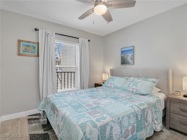 6893 Estero Blvd Unit 416, Fort Myers Beach, FL 33931 - bedroom featuring wood finished floors and a ceiling fan