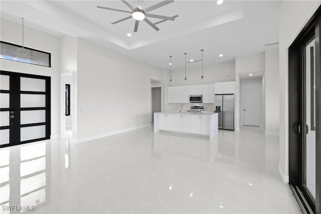 kitchen with appliances with stainless steel finishes, white cabinetry, modern cabinets, and recessed lighting