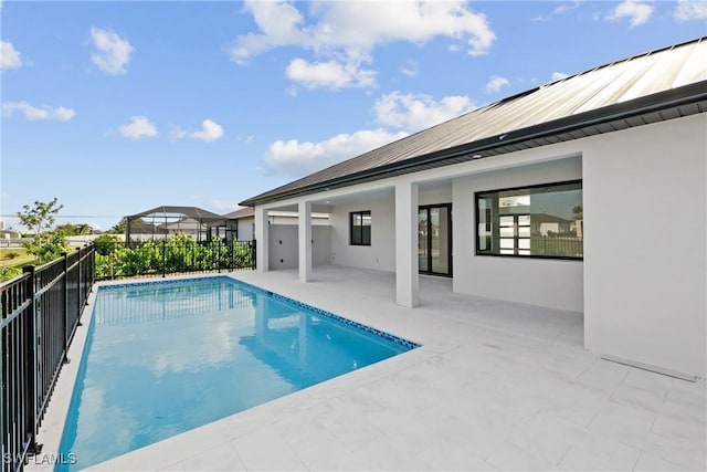 view of pool featuring a patio, fence, and a fenced in pool