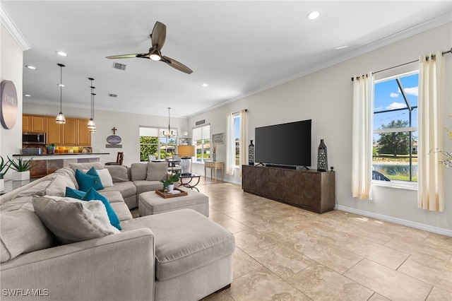 14790 Fripp Island Ct, Naples, FL 34119 - living area with recessed lighting, baseboards, a ceiling fan, ornamental molding, and a chandelier