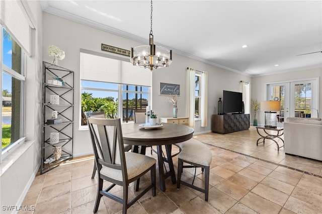 14790 Fripp Island Ct, Naples, FL 34119 - dining area featuring crown molding, a chandelier, french doors, recessed lighting, and baseboards