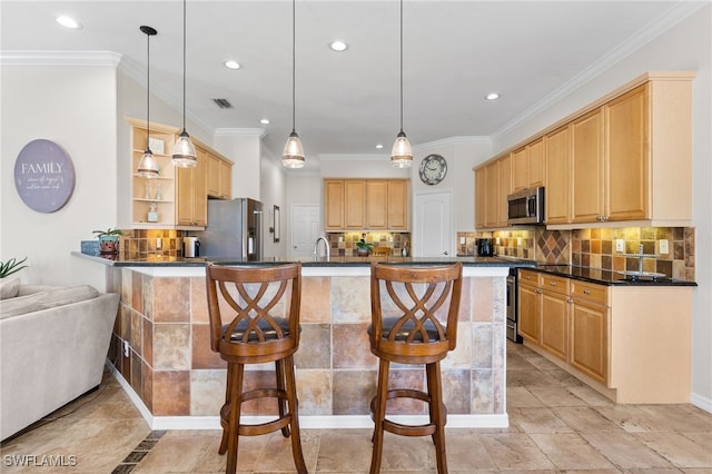 14790 Fripp Island Ct, Naples, FL 34119 - kitchen featuring appliances with stainless steel finishes, a kitchen bar, dark countertops, open shelves, and recessed lighting