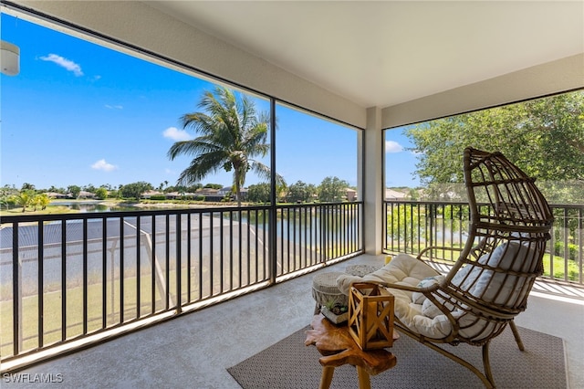 14790 Fripp Island Ct, Naples, FL 34119 - sunroom with a water view and carpet