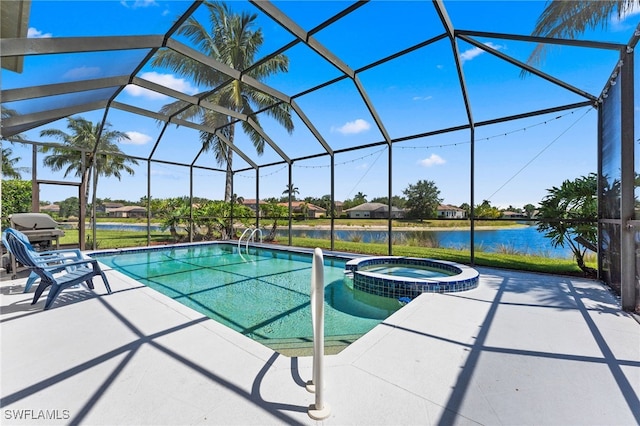 14790 Fripp Island Ct, Naples, FL 34119 - view of swimming pool featuring a patio, a pool with connected hot tub, a water view, and glass enclosure