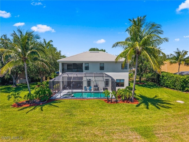 14790 Fripp Island Ct, Naples, FL 34119 - rear view of property with an outdoor pool, a lawn, a lanai, and stucco siding