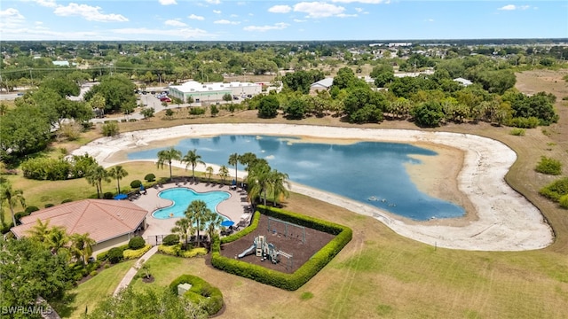 bird's eye view with a water view