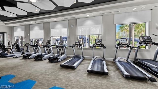 gym with carpet flooring and recessed lighting
