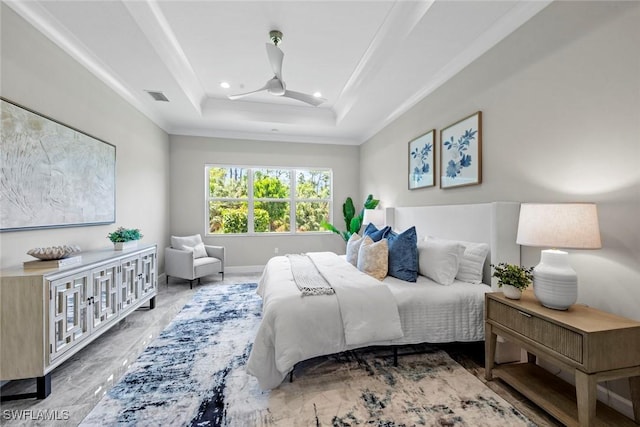 bedroom featuring visible vents, ornamental molding, a tray ceiling, and recessed lighting