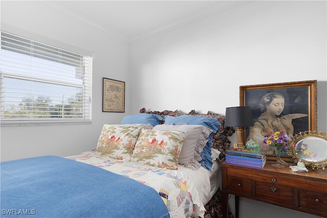 bedroom featuring ornamental molding