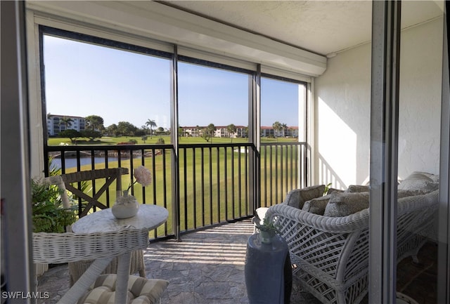 sunroom with a residential view