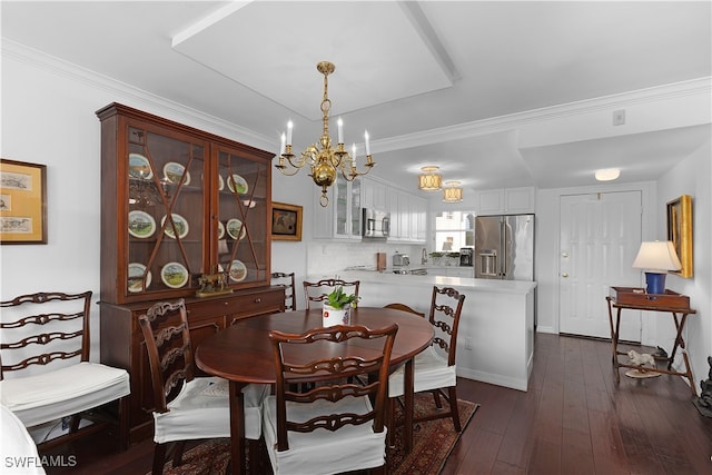 dining room featuring a chandelier, crown molding, and dark wood-style floors