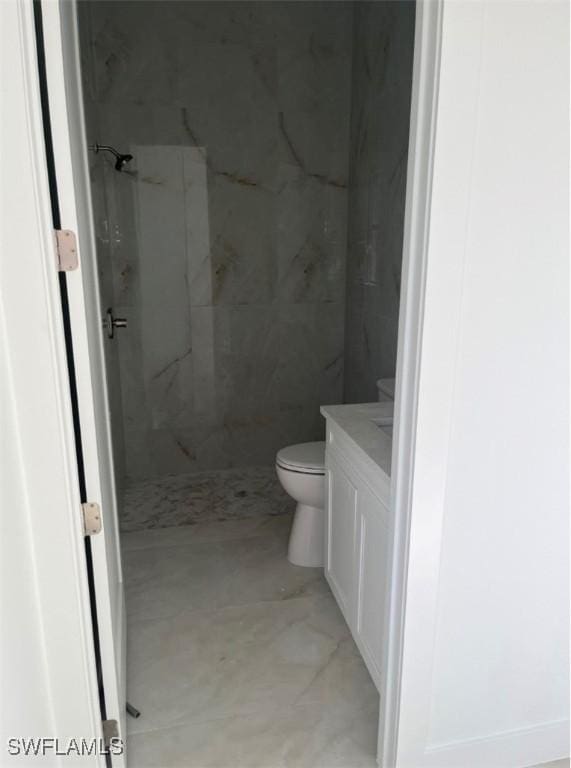 463 Latic Ave S, Lehigh Acres, FL 33974 - bathroom with vanity and a marble finish shower