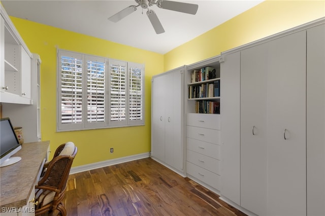 office area with baseboards, a ceiling fan, and wood finished floors