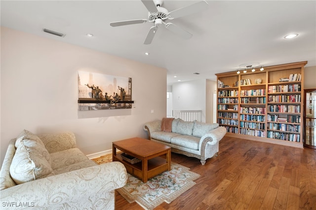living area featuring ceiling fan, recessed lighting, baseboards, wood finished floors, and visible vents