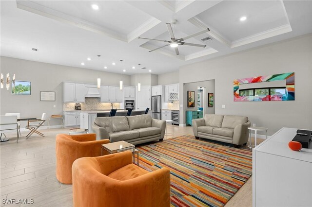 16166 Herons View Dr, Alva, FL 33920 - living area featuring visible vents, beam ceiling, recessed lighting, coffered ceiling, and ceiling fan with notable chandelier
