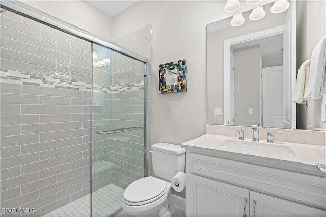 16166 Herons View Dr, Alva, FL 33920 - bathroom featuring vanity, a stall shower, and toilet