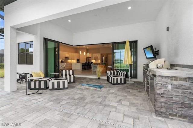 16166 Herons View Dr, Alva, FL 33920 - view of patio with exterior kitchen