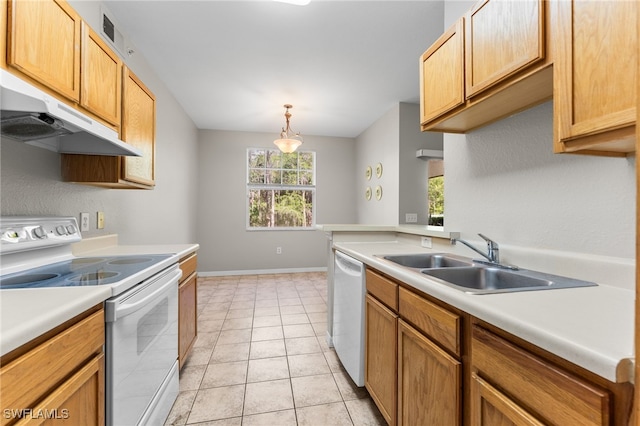 7940 Preserve Cir Unit 914, Naples, FL 34119 - kitchen with white appliances, under cabinet range hood, a sink, and light countertops