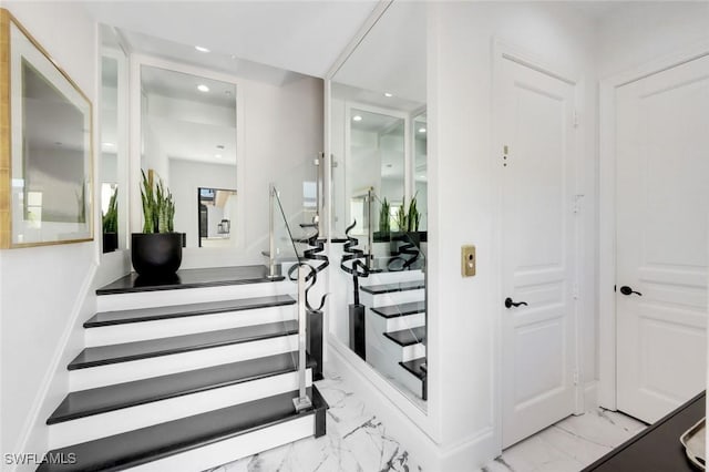 16653 Toscana Cir Unit 704, Naples, FL 34110 - stairs featuring marble finish floors and recessed lighting