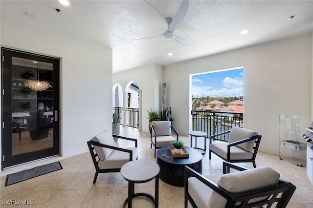 16653 Toscana Cir Unit 704, Naples, FL 34110 - view of patio with ceiling fan and a balcony
