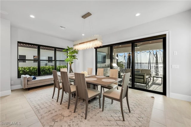 3924 W Riverside Dr, Fort Myers, FL 33901 - dining room featuring recessed lighting, baseboards, visible vents, and a notable chandelier