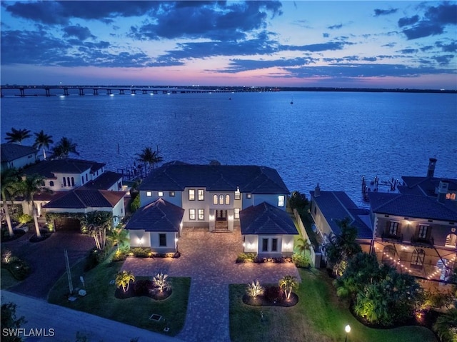 3924 W Riverside Dr, Fort Myers, FL 33901 - aerial view at dusk with a water view