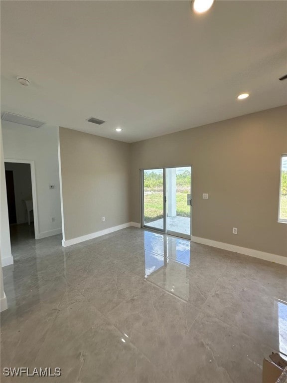 961 Countess Ave, Lehigh Acres, FL 33974 - unfurnished room featuring healthy amount of natural light, baseboards, and recessed lighting