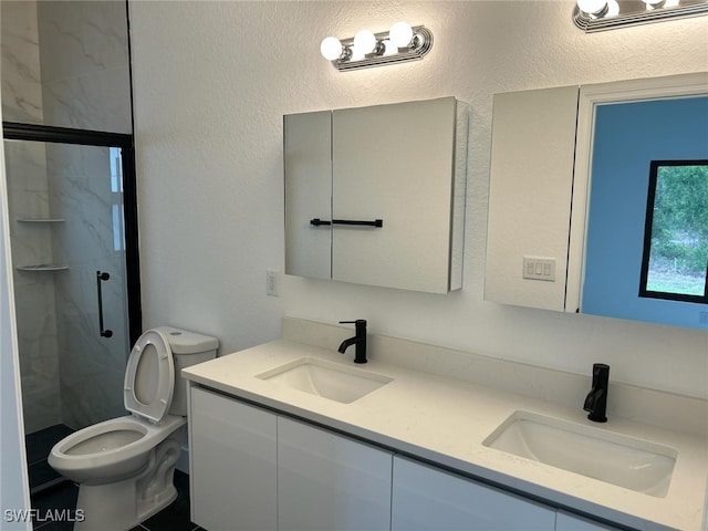 961 Countess Ave, Lehigh Acres, FL 33974 - full bathroom with a shower stall, toilet, double vanity, and a textured wall