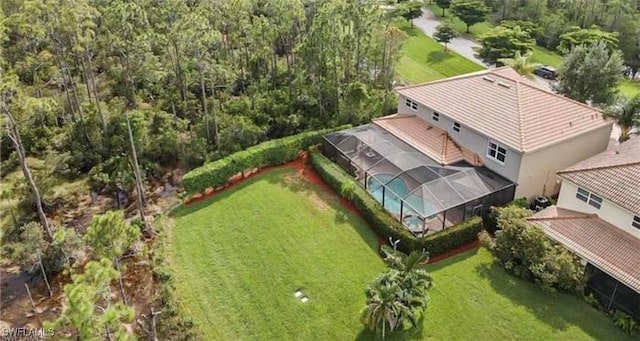 aerial view featuring a forest view