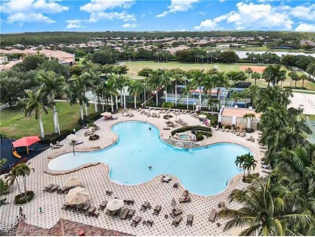 pool with a patio area