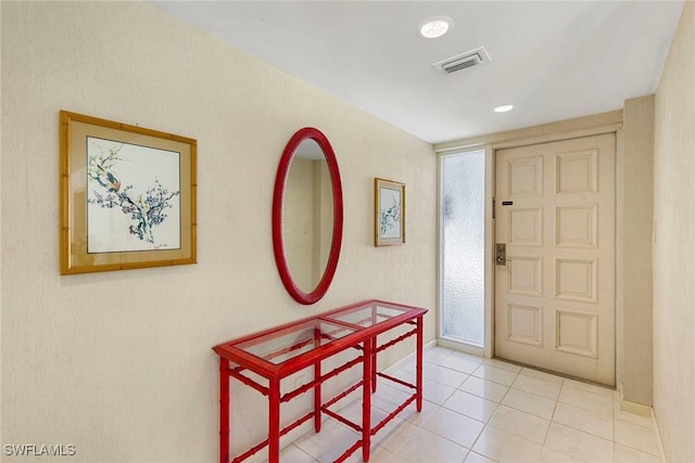 105 Wilderness Dr Unit B105, Naples, FL 34105 - entrance foyer with visible vents and light tile patterned floors