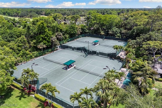 105 Wilderness Dr Unit B105, Naples, FL 34105 - birds eye view of property with a forest view