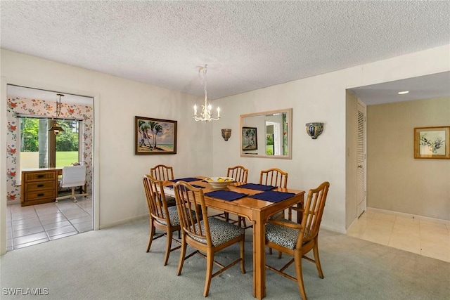 105 Wilderness Dr Unit B105, Naples, FL 34105 - dining room featuring an inviting chandelier, carpet flooring, and tile patterned flooring