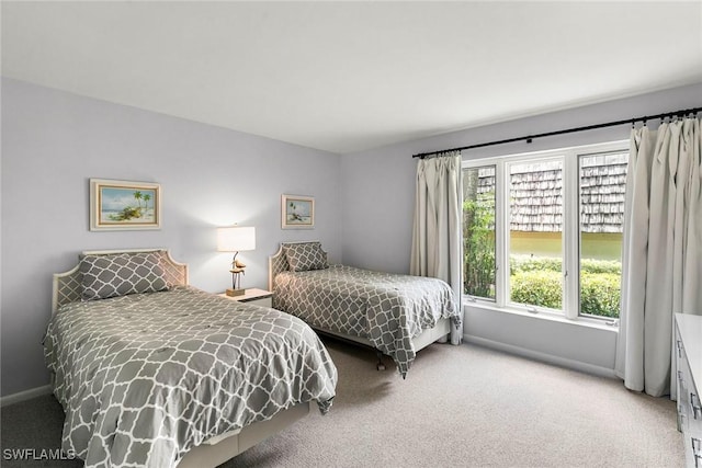 105 Wilderness Dr Unit B105, Naples, FL 34105 - carpeted bedroom with baseboards